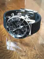 Breitling Superocean Heritage A13313 44mm mens watch with a black dial and rubber strap.