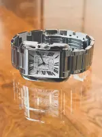 Cartier Tank Anglaise 3511, Cartier Tank Anglaise 3511 30mm x 39mm men's stainless steel watch with a sliver dial.