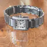 Cartier Tank Francaise 2384. Steel case and bracelet, white dial and diamond surround bezel.