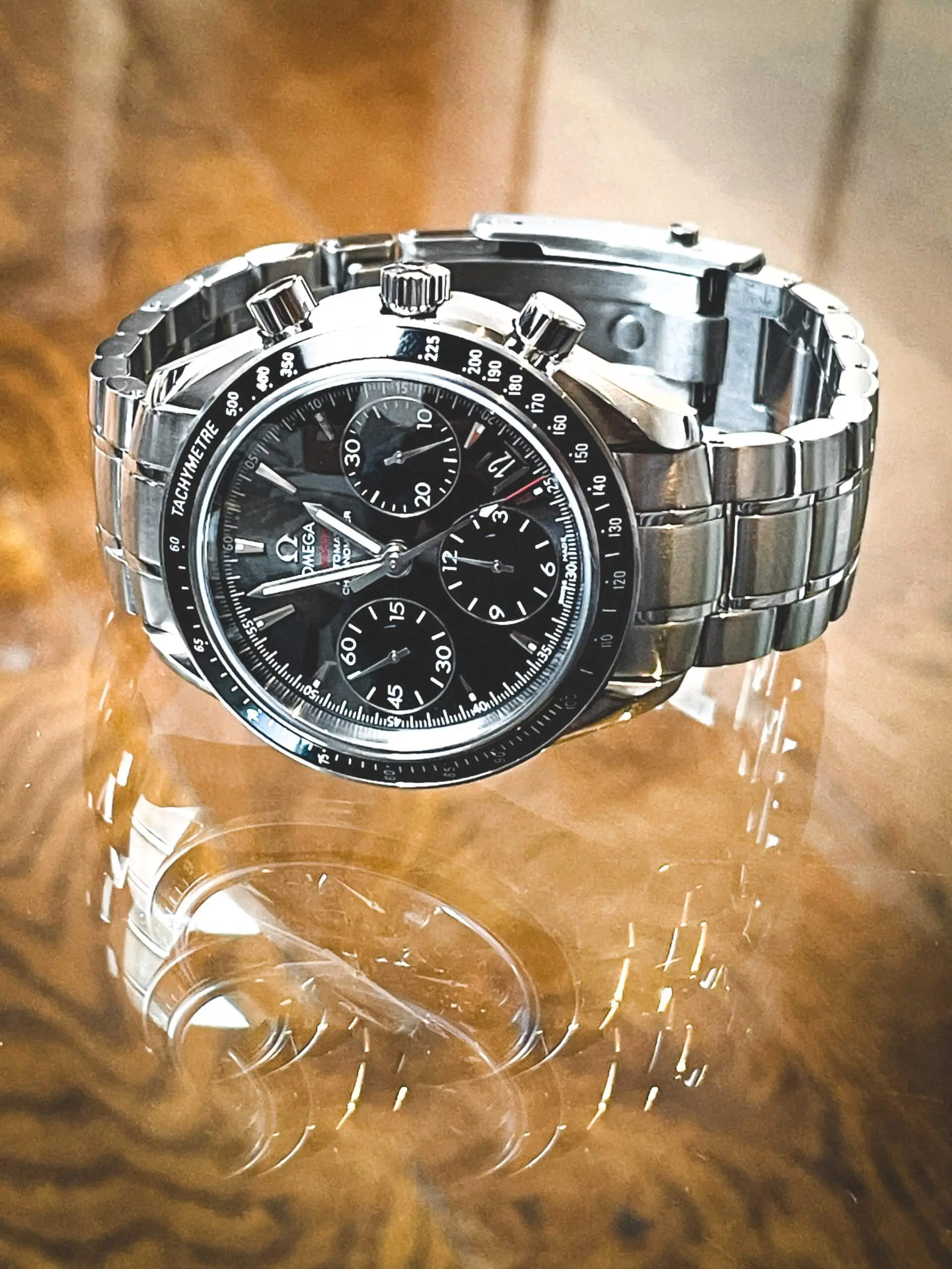 Omega Speedmaster Date 323.30.40.40.06.001 40mm Omega Speedmaster Date 323.30.40.40.06.001 40mm men's watch. Anthracite grey dial and a stainless steel case and bracelet.