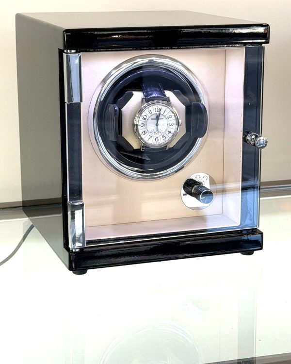 Watch winder, piano black case with redwood effect top, cream interior.