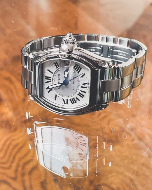 Cartier Roadster 2510 Men's watch with a silver dial and stainless steel strap.