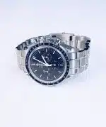 Omega Speedmaster Professional MoonWatch with a black dial, steel case and bracelet.