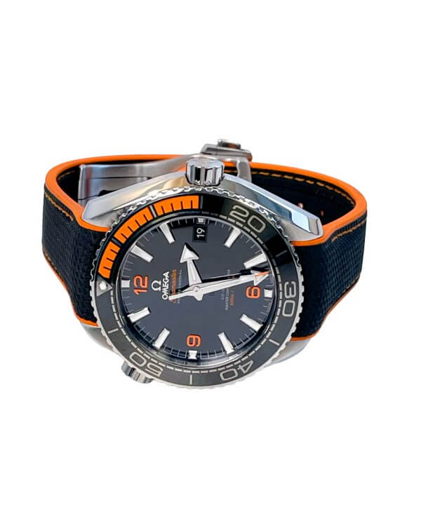 Omega Seamaster Planet Ocean 44mm watch with a black dial, ceramic bezel, black and orange rubber strap