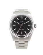 Rolex Oyster Perpetual 134300 with a black dial, smooth bezel and oyster bracelet