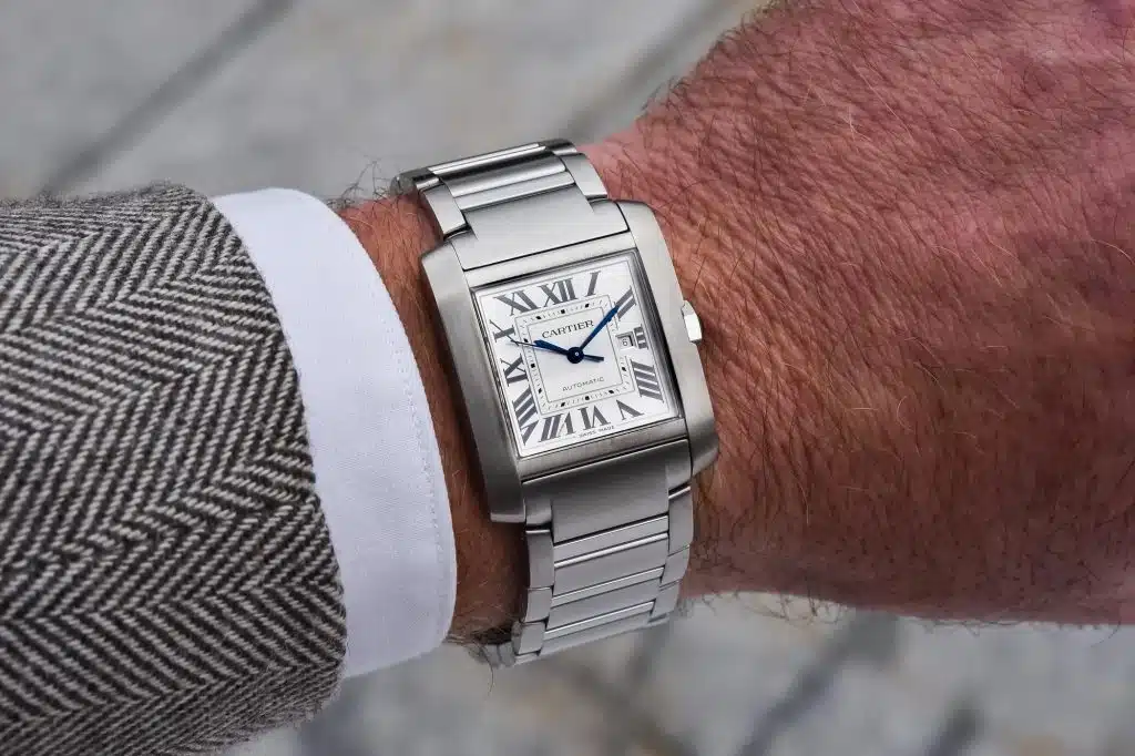 cartier tank on arm