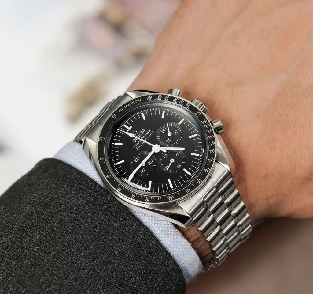 omega speedmaster on arm