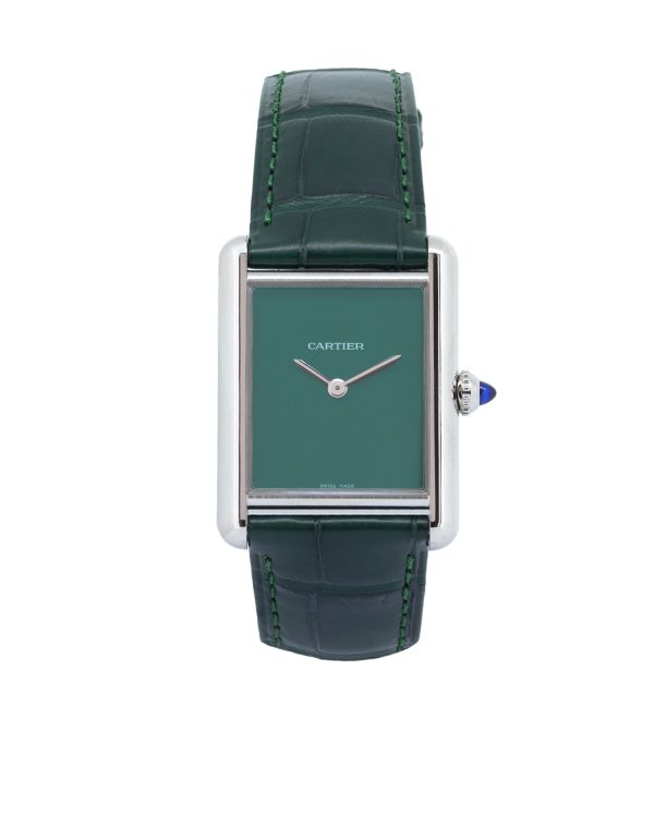 Cartier Tank Must WSTA0115 luxury watch featuring a polished stainless steel rectangular case, green lacquered dial without numerals, silver sword-shaped hands, cabochon crown, and matching green alligator leather strap.