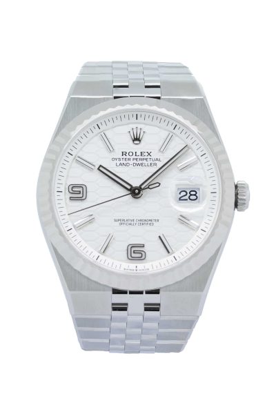 Rolex Land-Dweller 40 Ref. 127334 in White Rolesor, featuring an intense white honeycomb-motif dial, fluted 18 ct white gold bezel, date display with Cyclops lens, and integrated Flat Jubilee bracelet.