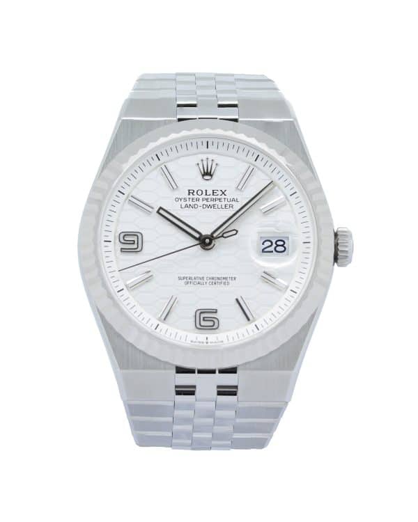 Rolex Land-Dweller 40 Ref. 127334 in White Rolesor, featuring an intense white honeycomb-motif dial, fluted 18 ct white gold bezel, date display with Cyclops lens, and integrated Flat Jubilee bracelet.