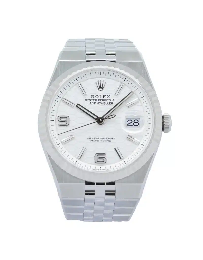 Rolex Land-Dweller 40 Ref. 127334 in White Rolesor, featuring an intense white honeycomb-motif dial, fluted 18 ct white gold bezel, date display with Cyclops lens, and integrated Flat Jubilee bracelet.
